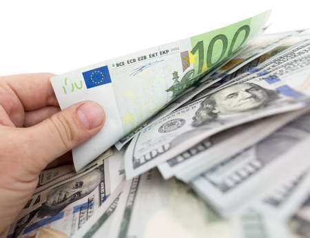 euro in his hand on a white background
