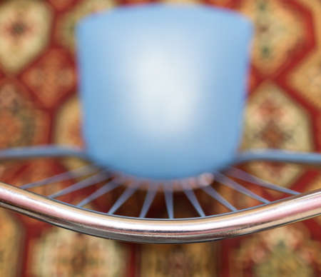 metal back of the chair in the backgroundの写真素材