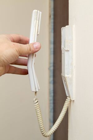 phone attached to the wall