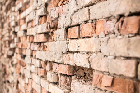Old brick wall as backgroundの写真素材