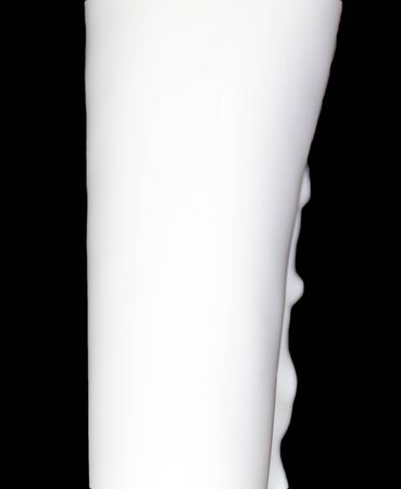 milk on a black backgroundの写真素材