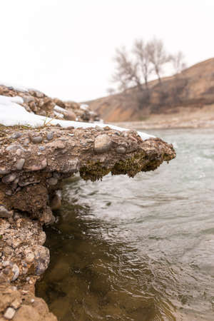 mountain river in the winter in natureの写真素材