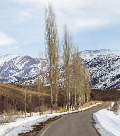 winter road in the mountains of Kazakhstanの写真素材