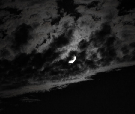 moon with clouds at nightの写真素材