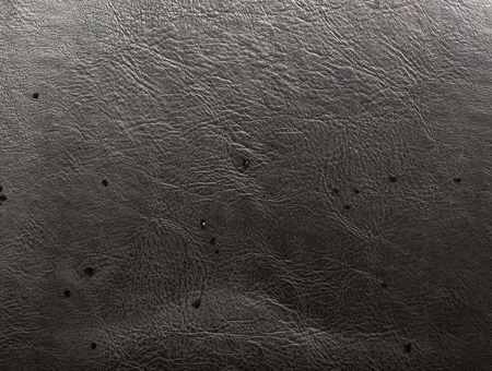 water on black leather