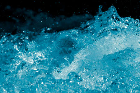 water spray from the wavesの写真素材