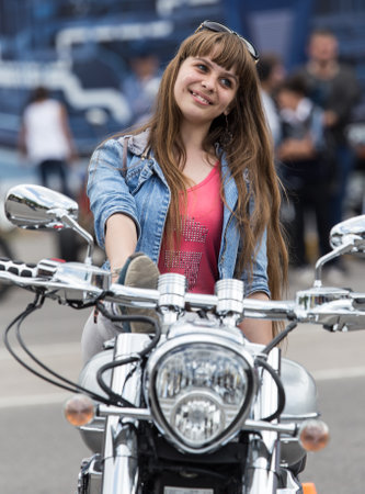 Shymkent, KAZAKHSTAN - April 23, 2016: woman on a bike at the opening of bike season in Shymkent, 23...