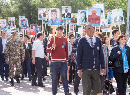 SHYMKENT city, KAZAKHSTAN MAY 9, 2015: Victory Day in memory of the soldiers of the Great Patriotic War. The photograph izobrazhon Immortal Regimentのeditorial素材