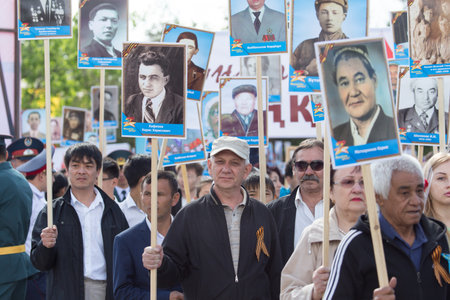 SHYMKENT city, KAZAKHSTAN MAY 9, 2015: Victory Day in memory of the soldiers of the Great Patriotic War. The photograph izobrazhon Immortal Regimentのeditorial素材
