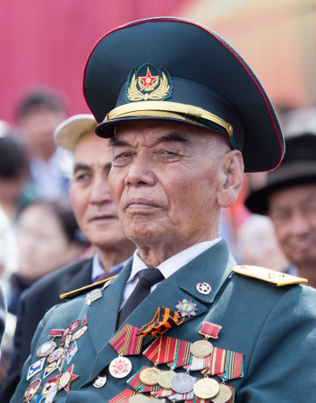 SHYMKENT city, KAZAKHSTAN MAY 9, 2015: Veterans of War. Victory Day. The memory of soldiers of the Great Patriotic War. Victory Day celebration in the city of Shymkent, Kazakhstan May 9, 2015のeditorial素材