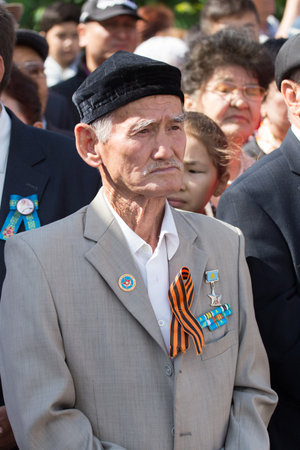 SHYMKENT city, KAZAKHSTAN MAY 9, 2015: Veterans of War. Victory Day. The memory of soldiers of the Great Patriotic War. Victory Day celebration in the city of Shymkent, Kazakhstan May 9, 2015のeditorial素材