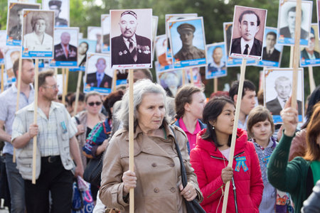 SHYMKENT city, KAZAKHSTAN MAY 9, 2015: Victory Day in memory of the soldiers of the Great Patriotic War. The photograph izobrazhon Immortal Regimentのeditorial素材