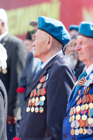 SHYMKENT city, KAZAKHSTAN MAY 9, 2015: Veterans of War. Victory Day. The memory of soldiers of the Great Patriotic War. Victory Day celebration in the city of Shymkent, Kazakhstan May 9, 2015のeditorial素材