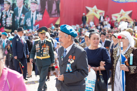 SHYMKENT city, KAZAKHSTAN MAY 9, 2015: Veterans of War. Victory Day. The memory of soldiers of the Great Patriotic War. Victory Day celebration in the city of Shymkent, Kazakhstan May 9, 2015のeditorial素材