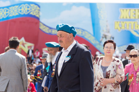 SHYMKENT city, KAZAKHSTAN MAY 9, 2015: Veterans of War. Victory Day. The memory of soldiers of the Great Patriotic War. Victory Day celebration in the city of Shymkent, Kazakhstan May 9, 2015のeditorial素材