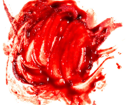 smeared red blood on white backgroundの写真素材