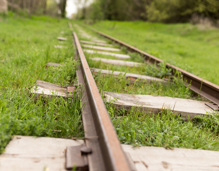 old railway in the grassの写真素材