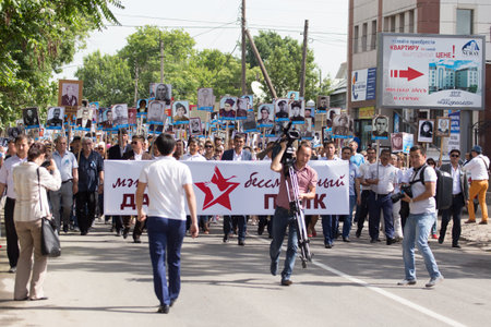 Shymkent, KAZAKHSTAN May 8, 2016: Immortal regiment .Den Victory in memory of the soldiers of the Great Patriotic War. Victory Day celebration in the city of Shymkent, Kazakhstan, May 8, 2016のeditorial素材