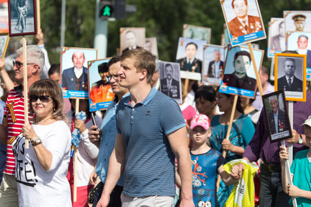 Shymkent, KAZAKHSTAN May 8, 2016: Immortal regiment .Den Victory in memory of the soldiers of the Great Patriotic War. Victory Day celebration in the city of Shymkent, Kazakhstan, May 8, 2016のeditorial素材