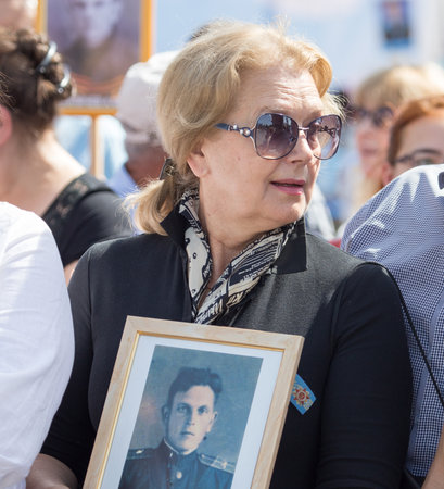 Shymkent, KAZAKHSTAN May 8, 2016: Irina Alferov People's Artist of Russia in the Immortal regiment....