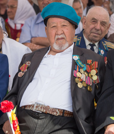 SHYMKENT city, KAZAKHSTAN MAY 8, 2016: Veterans of War. Victory Day. The memory of soldiers of the Great Patriotic War. Victory Day celebration in the city of Shymkent, Kazakhstan May 8, 2016のeditorial素材