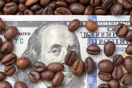 One hundred dollars in coffee beansの写真素材