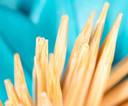 toothpicks on a blue background. macroの写真素材