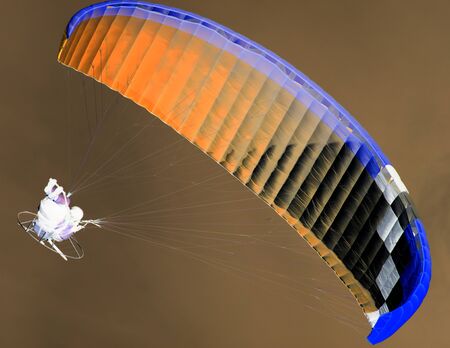 Parachute in the sky in the inversion