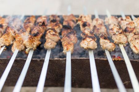 grilled skewers on the grillの写真素材
