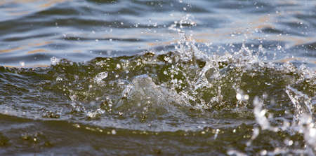 spray on the surface of the waterの写真素材