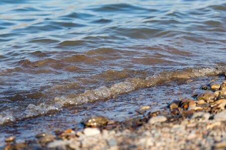 wave on the shore as the backgroundの写真素材