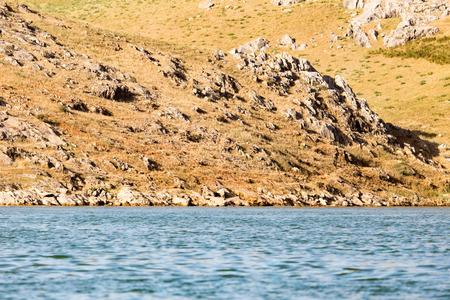 a beautiful lake in the mountains of Kazakhstanの写真素材