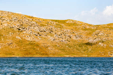 a beautiful lake in the mountains of Kazakhstanの写真素材