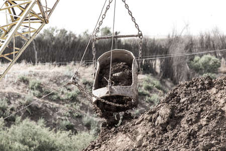 excavator digging a big bucketの写真素材