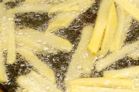 French fries fried in a pan