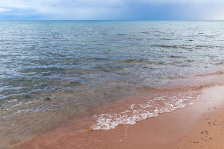 cloudy weather on the sea as backgroundの写真素材