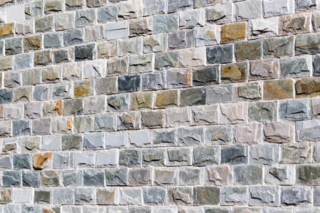 wall of granite bricks as background
