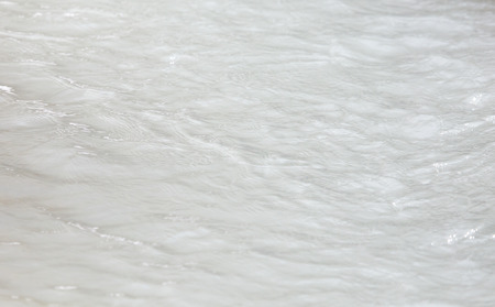 rough water in a mountain riverの写真素材