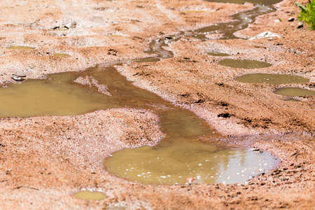 red puddle on the ground as a background