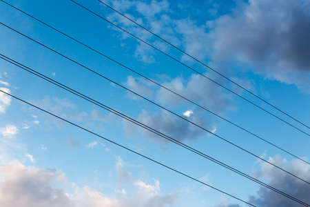 electrical wires on a background of night skyの写真素材