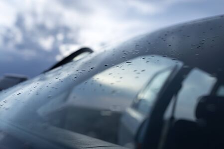raindrops on a windshield of car