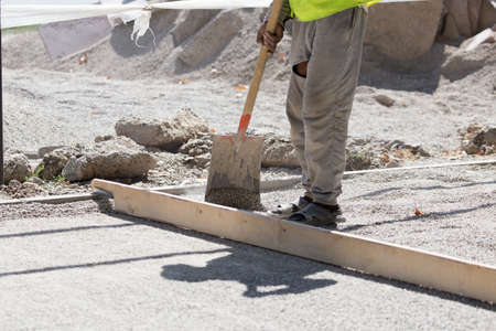 workers dub road sand and gravelの写真素材