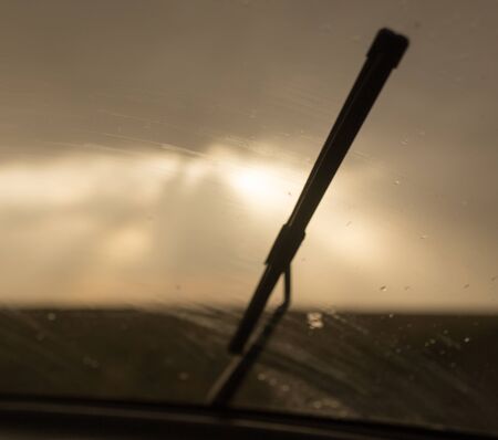 raindrops on a windshield of car