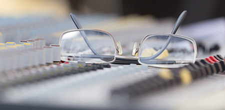 Concert music console with sunglassesの写真素材