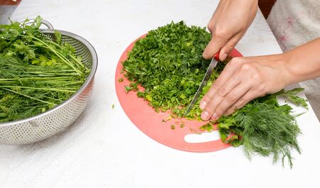 parsley and dill in the kitchenの写真素材