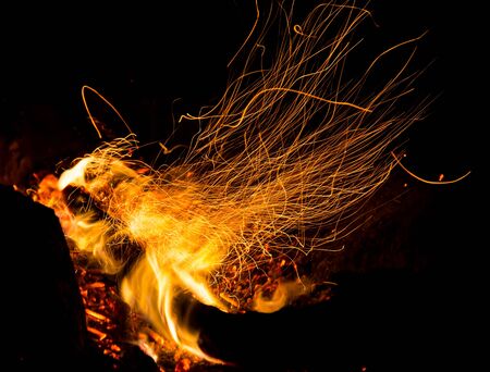 fire with sparks on a black background
