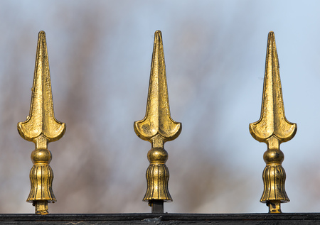 golden fence as a backdropの写真素材