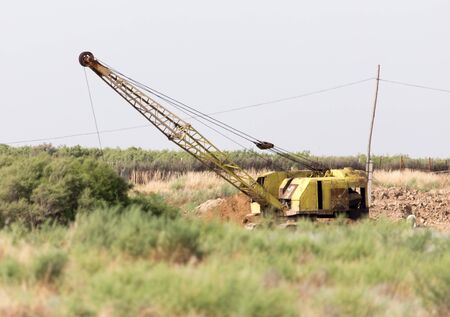 excavator digging a big bucketの写真素材