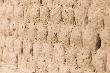 Brick wall made of clayの写真素材