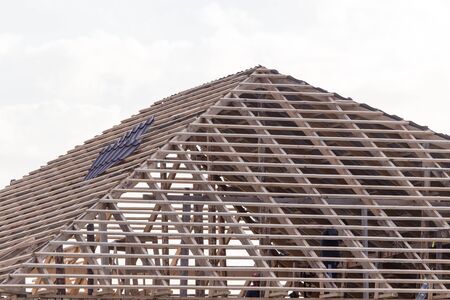 being built roof of the houseの写真素材